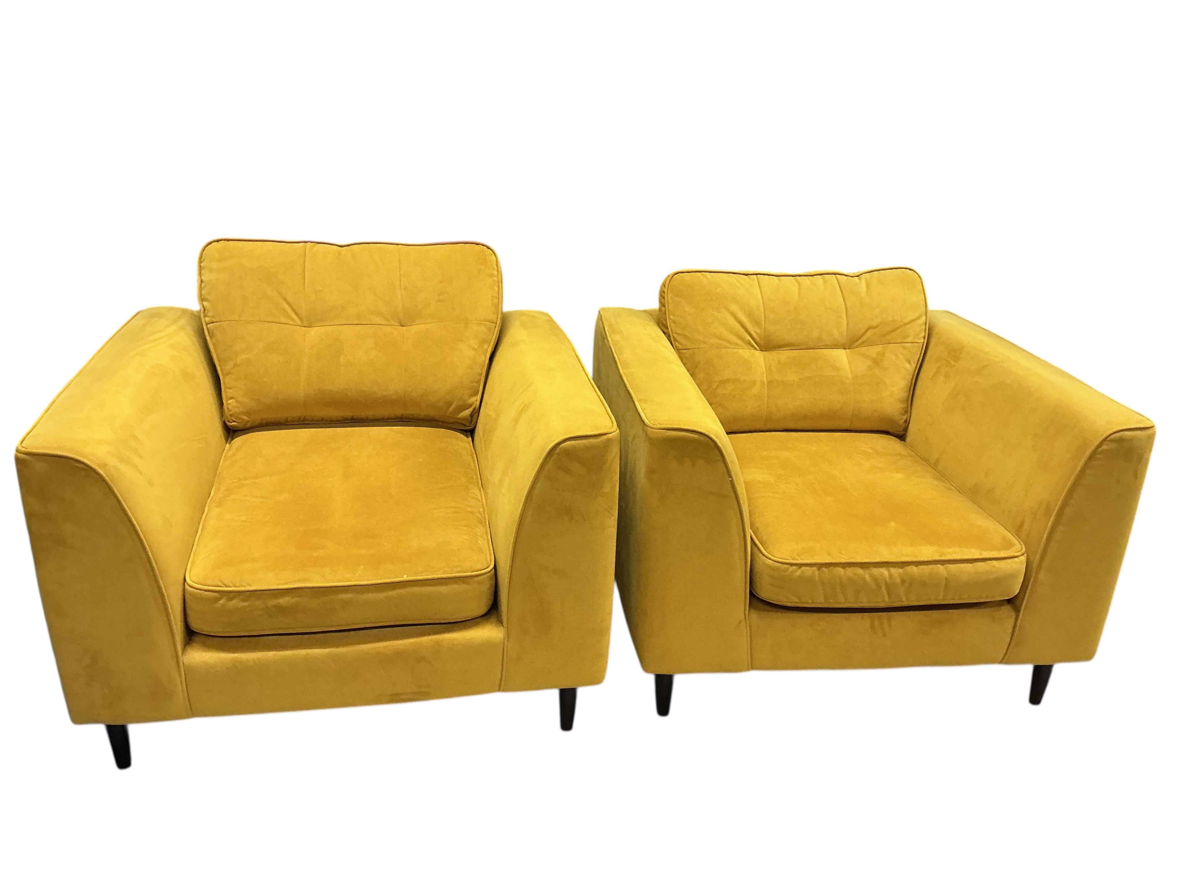 A pair of contemporary OKA mustard velvet lounge chairs, width 104cm, depth 96cm, height 78cm